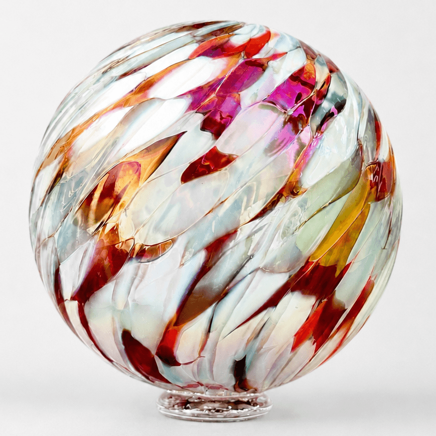 Coral Reef glass sculpture with swirls of coral, blush, and white colors, resembling a vibrant underwater reef.
