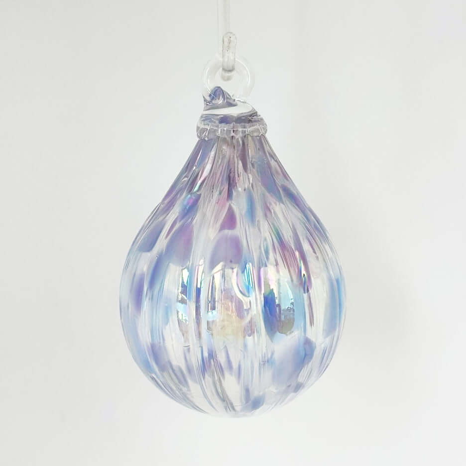 Bellflower glass ornament from the Lacey Collection, featuring iridescent colors and a tear-drop shape.