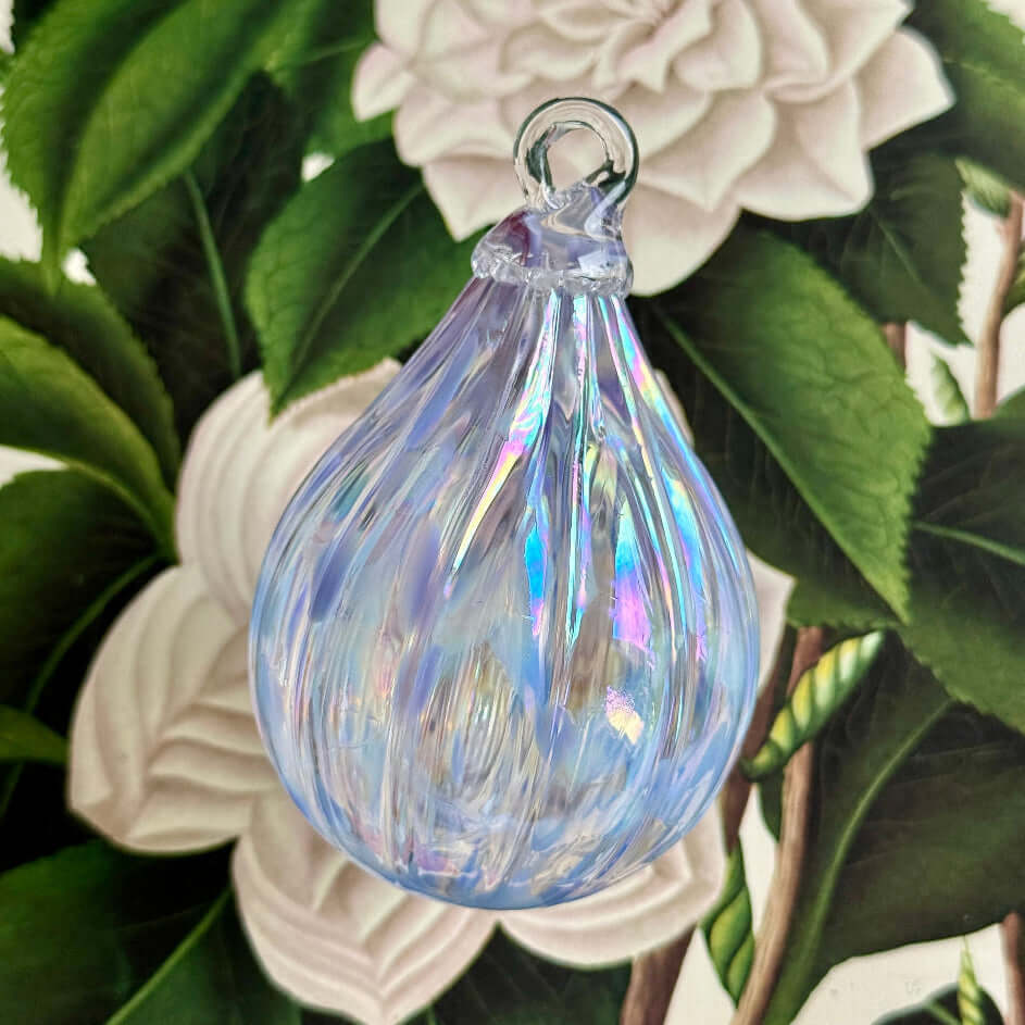 Bellflower glass ornament featuring iridescent swirls, part of the Lacey Collection.