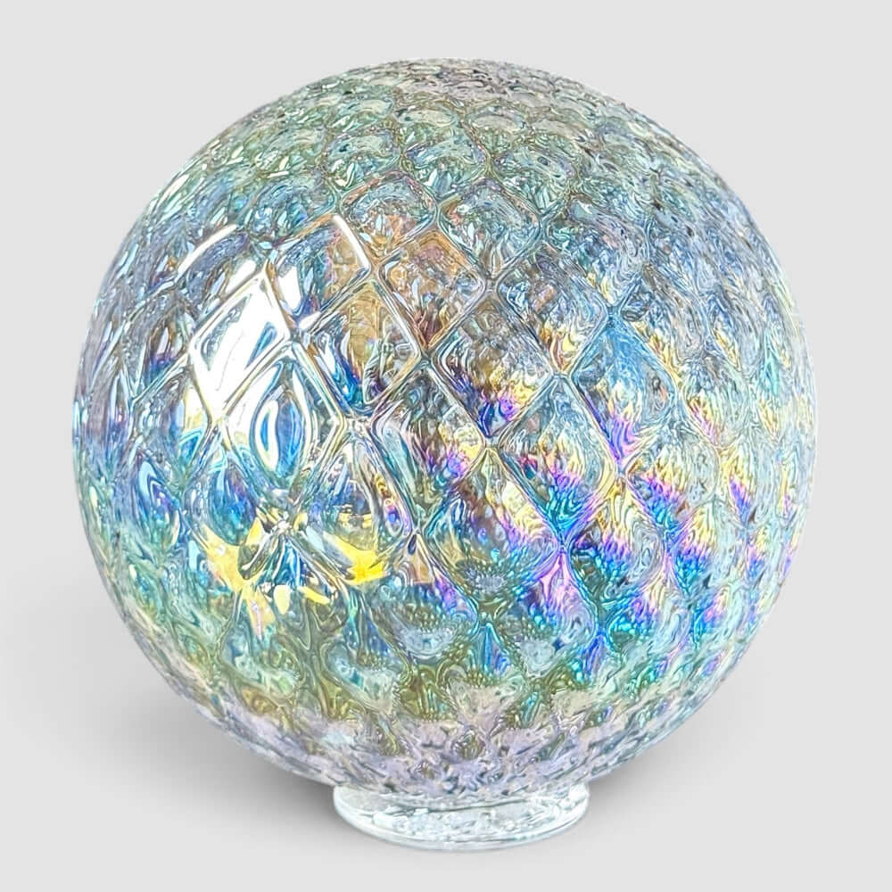 Alki Diamond Facet Float showing rainbow colors and jewel-like facets, perfect for tablescapes or decor.