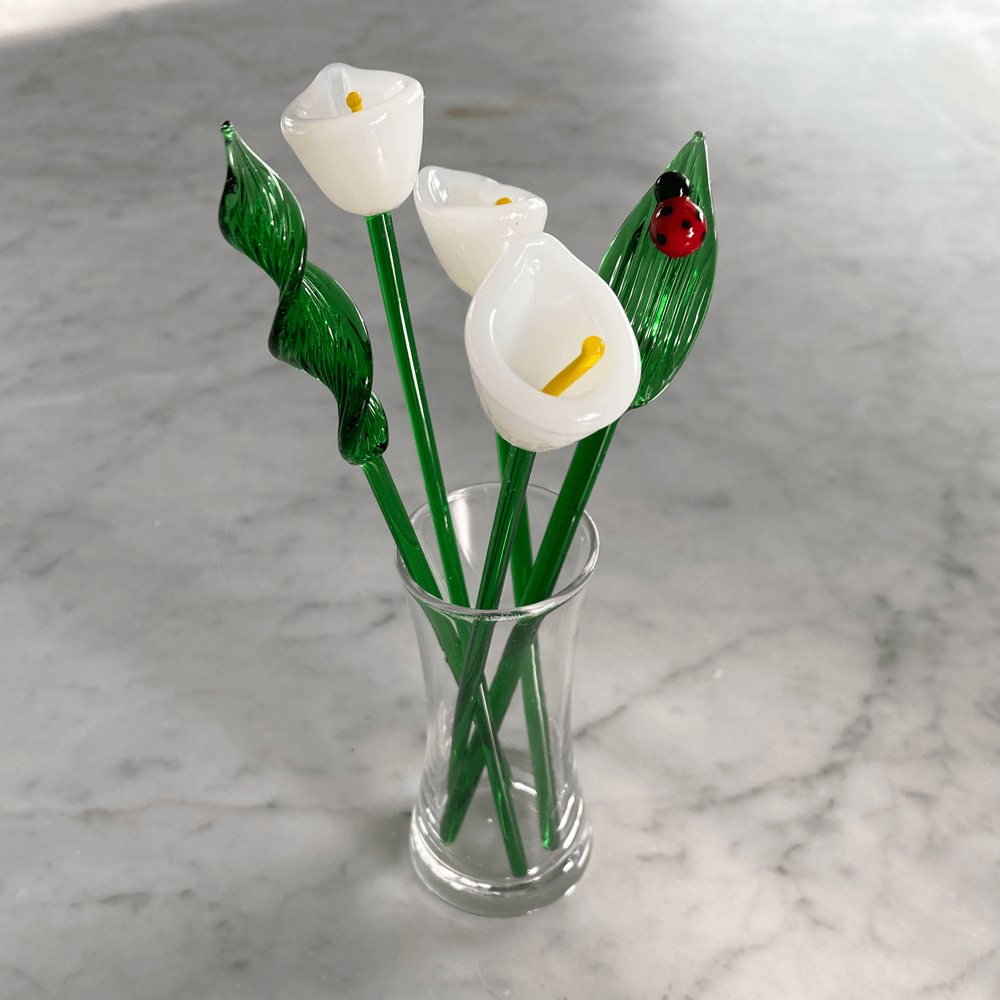 white calla lilies in glass column vase Flower Row Glass Bouquet: Calla Lily
